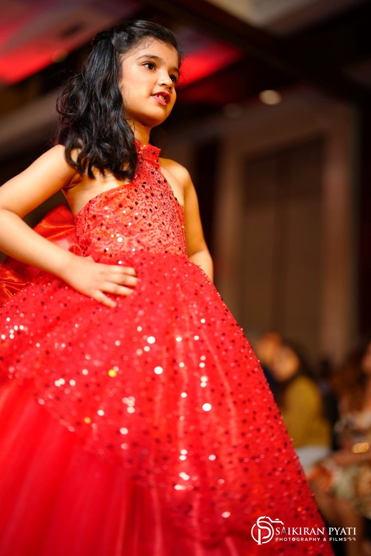 Red ball gown for girls with high-low pattern
