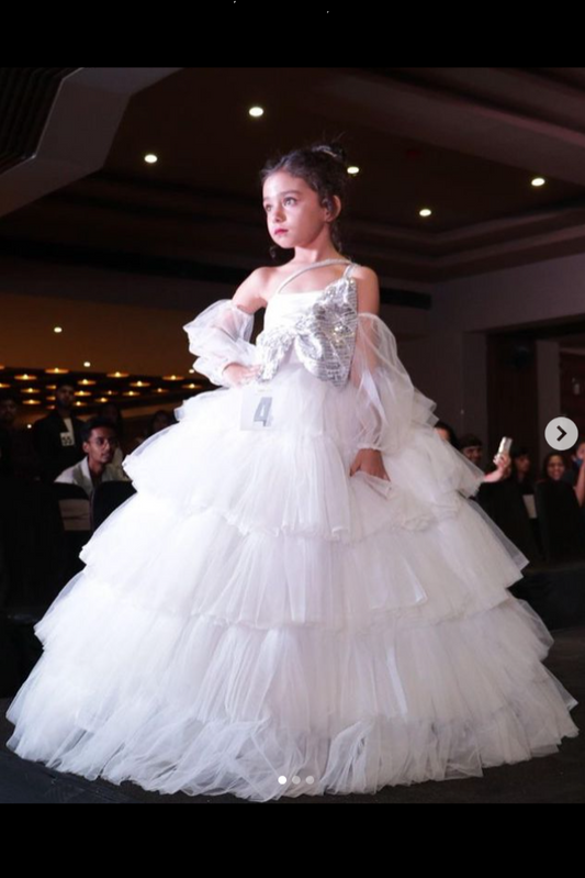 Ruffle ball gown with bow detailing